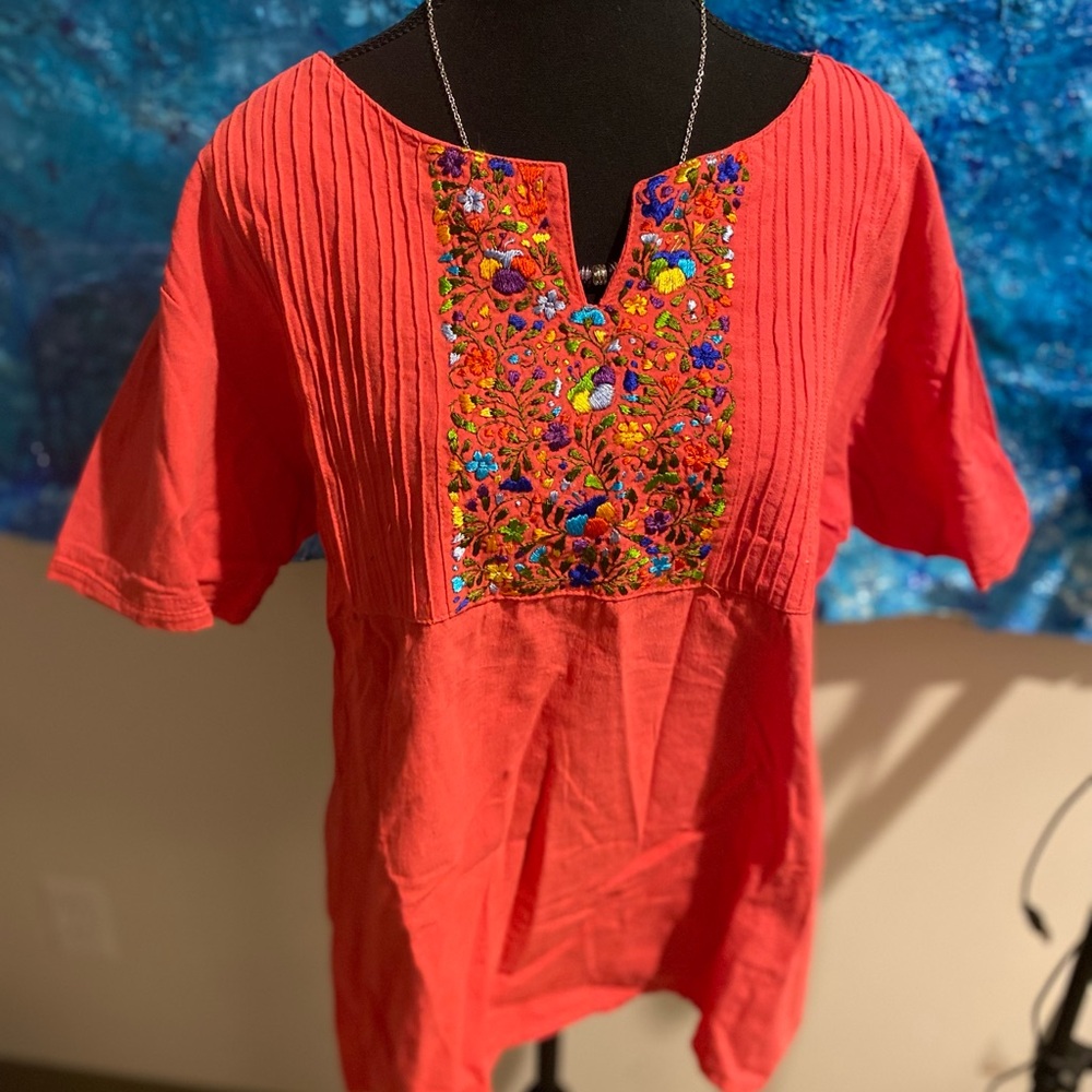 Pink coral or salmon colour top